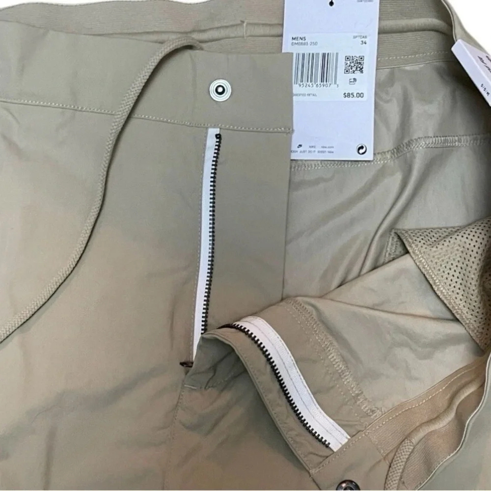 NEW Nike Pants Standard Fit Tapered Leg Men's Size 34 Tan Khaki Golf Pockets